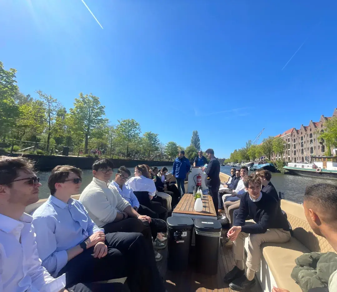 REA members on a canal boat in Amsterdam