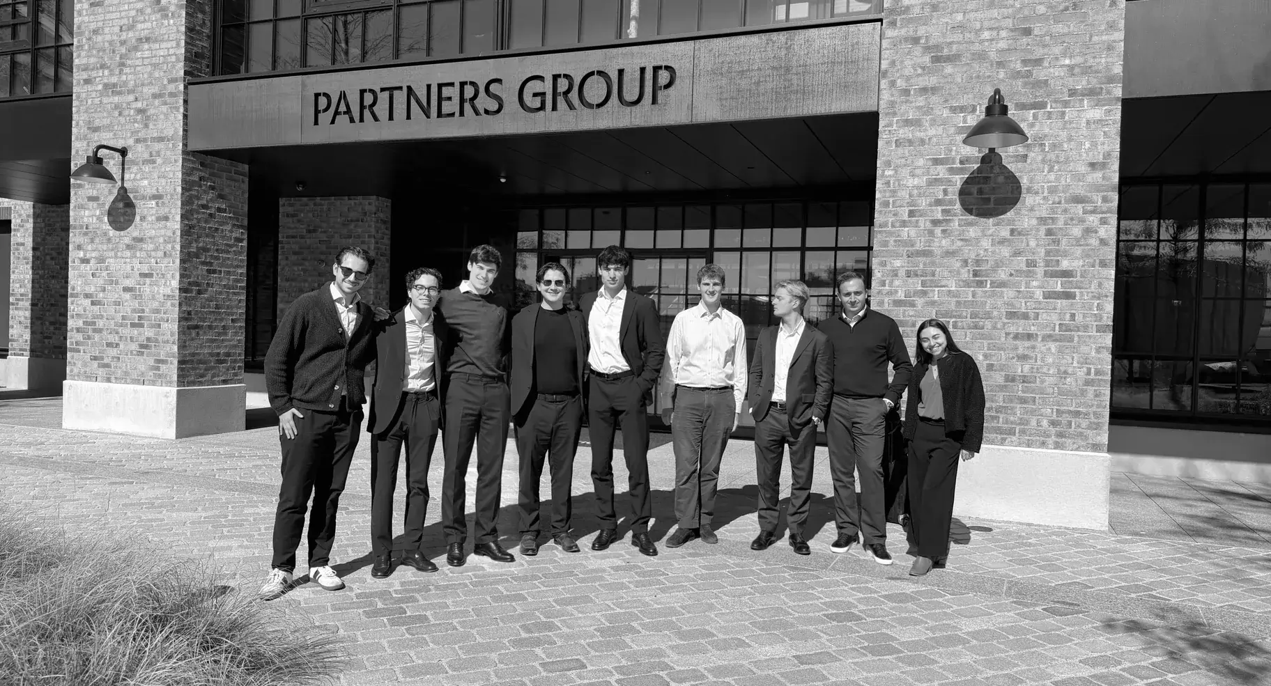 The group outside Partners Group’s headquarters in Zug