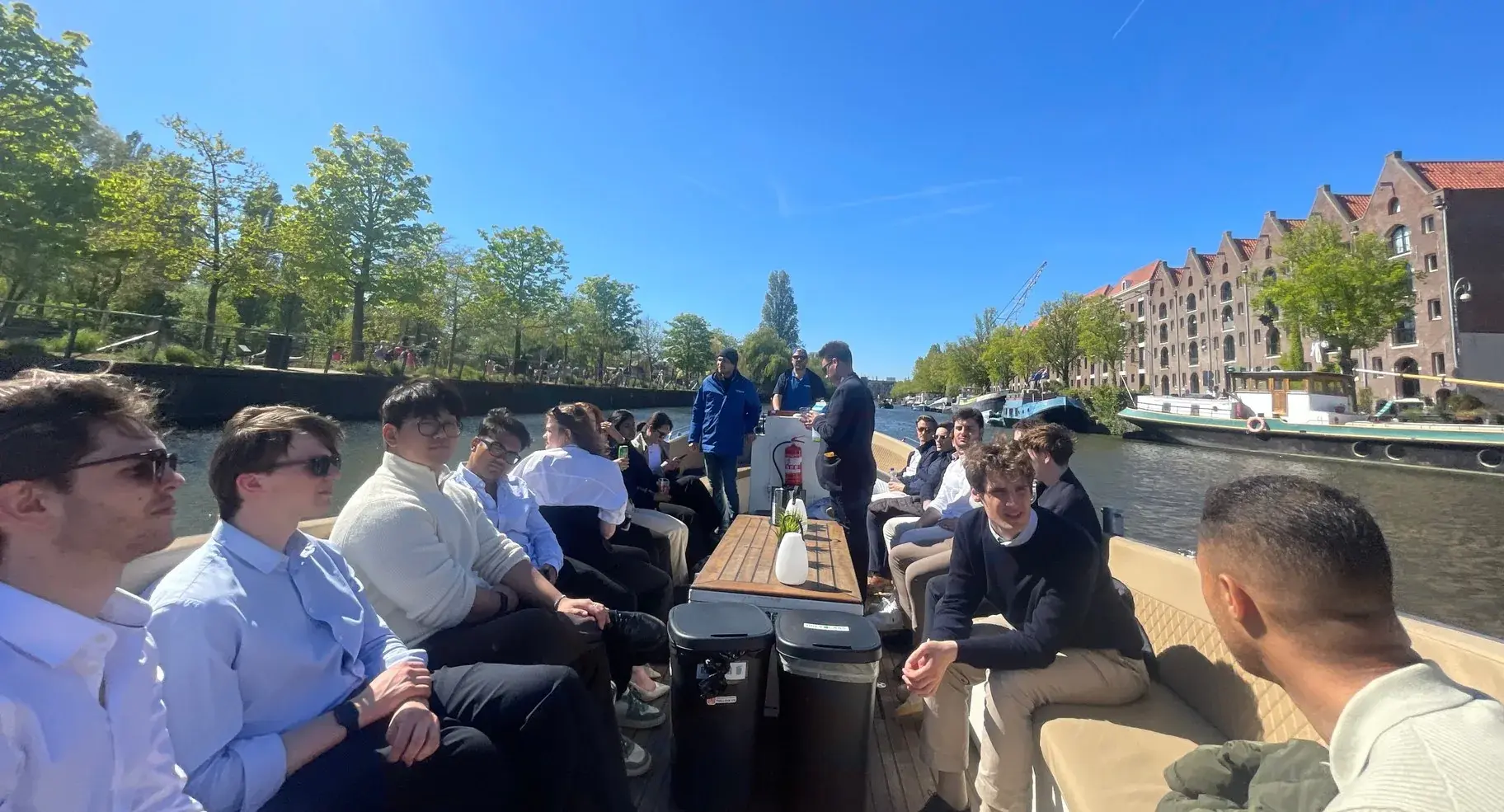 The group on a boat on an Amsterdam canal in the sunshine