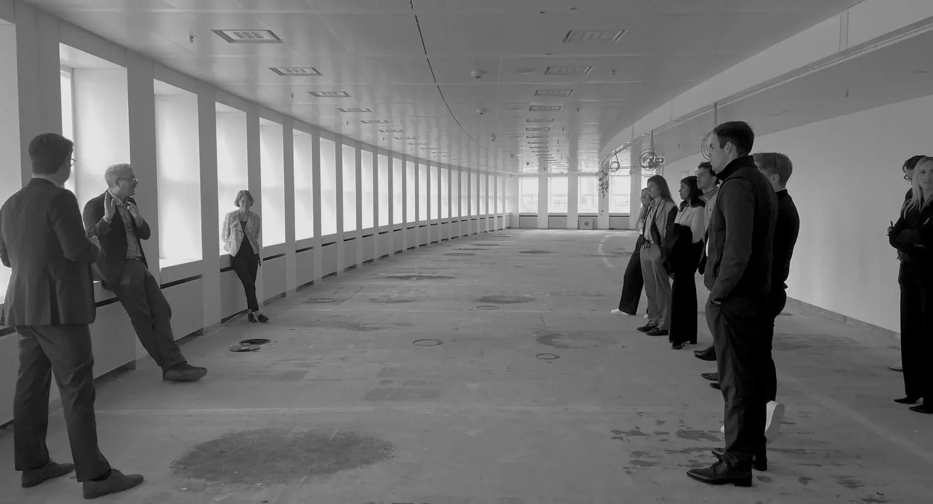 Members touring a project in high-visibility vests