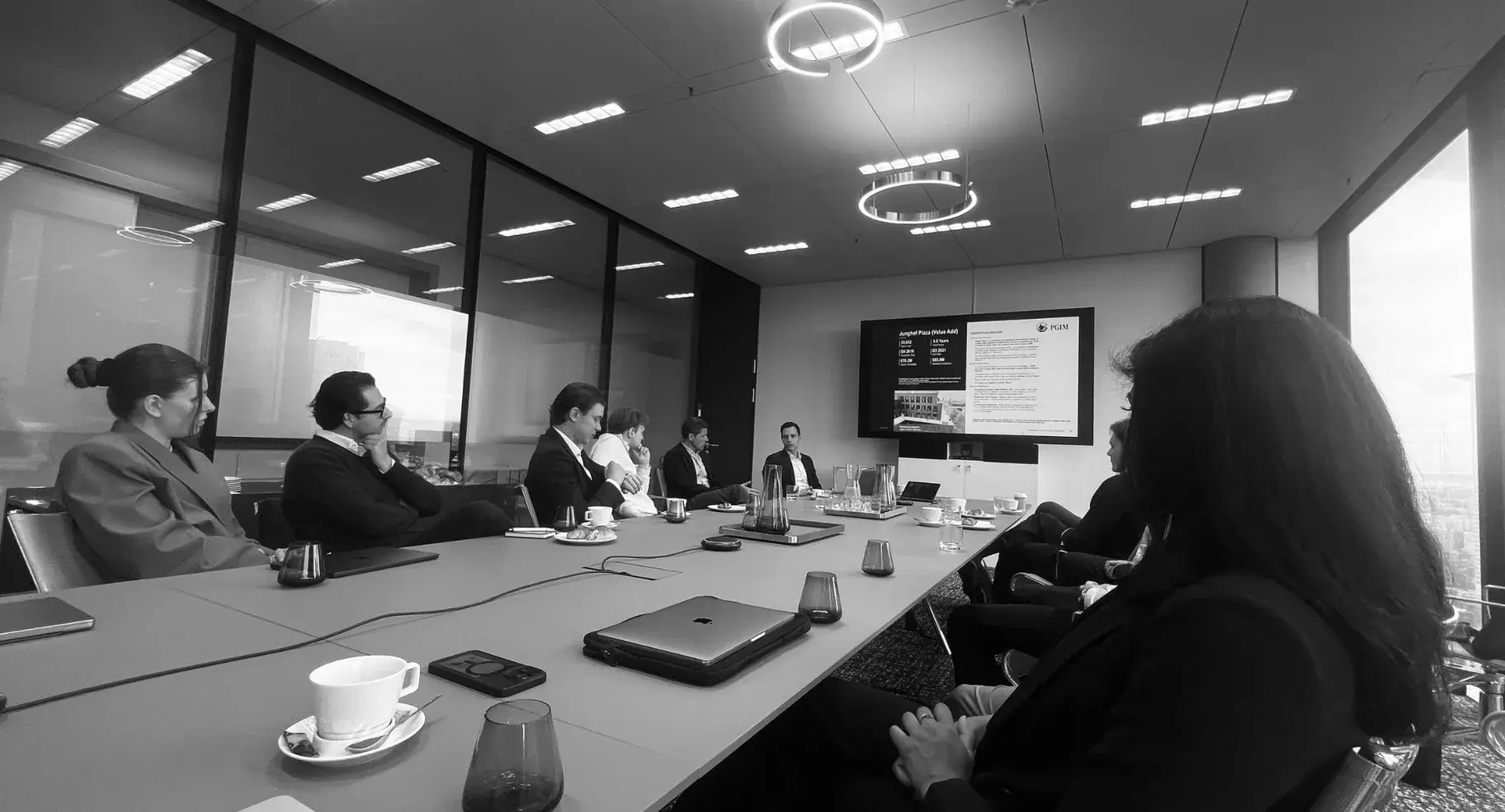 The group in a boardroom at PGIM Real Estate