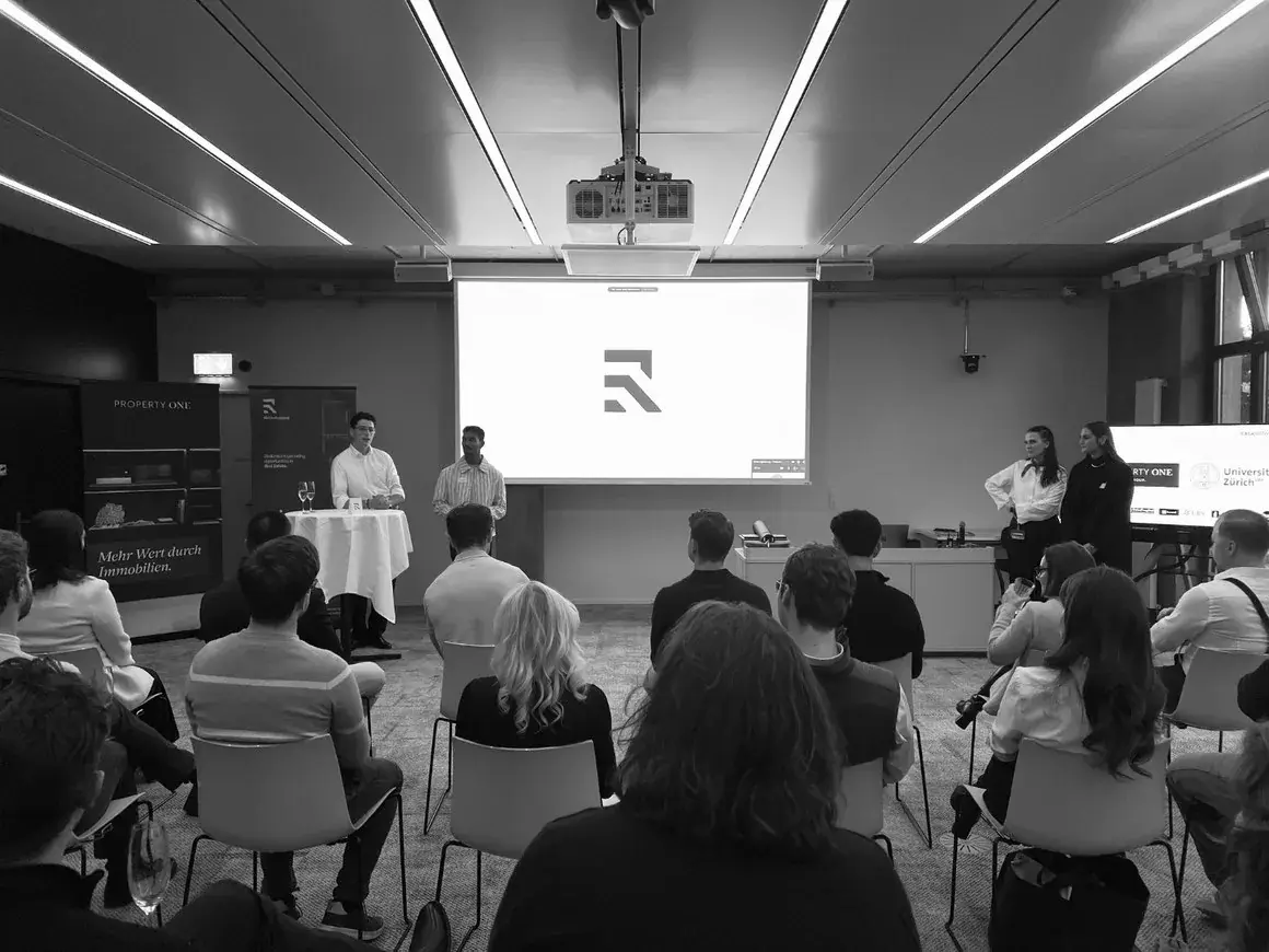The Zurich kickoff, with the REA mark on screen