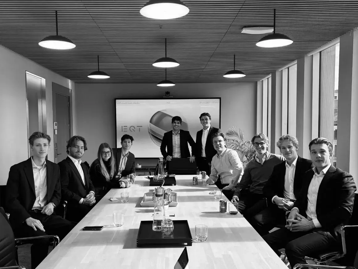 A chapter team around a boardroom table