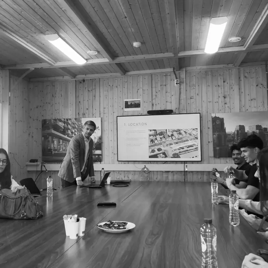 A speaker walking members through a case study